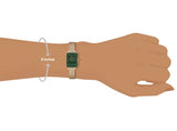 DW00100437-1 green watch on wrist, 6-inch wrist size.