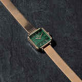 Rose gold watch with green malachite face