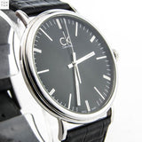 Calvin Klein Surround Black Dial Black Leather Strap Watch for Men - K3W211C1