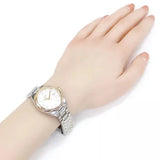 Stainless steel watch on wrist - MLB78236392769
