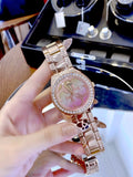 Guess G Twist Diamonds Rose Gold Dial Rose Gold Steel Strap Watch For Women - W1201L3