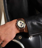 Fossil FS6042 watch on wrist with leather jacket.