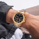 Guess watch GW0539G2 gold chronograph on wrist