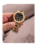 Guess GW0539G2 gold watch on wrist