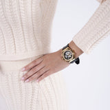 GW0553L4_M gold watch on wrist
