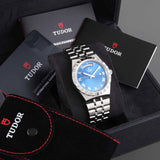 Tudor watch H22848-L274816433 with blue face, in box with paperwork.