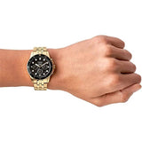 Gold wristwatch on wrist, IMG_20240810