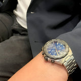 Man wearing blue-faced watch, IMG_447806_97690152-8329-42fc-8308-204b5be1fa99