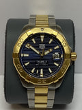TAG Heuer Aquaracer watch with gold bezel and blue dial