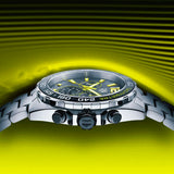Tag Heuer CAZ101AG watch still life on yellow background