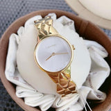 Calvin Klein K6E23546-4 gold watch on white cloth