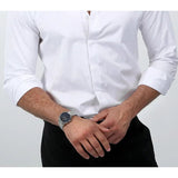 Man in white shirt with wristwatch