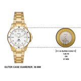 Fossil gold watch with 10 Rupee coin comparison