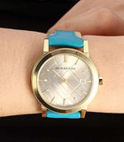 Burberry The City Gold Dial Blue Leather Strap Watch for Women - BU9018