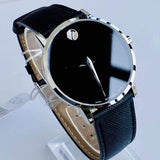 Movado watch with black face and leather band