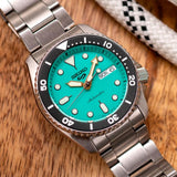 Seiko 5 Sports SKX Midi Automatic Teal Dial Silver Steel Strap Watch For Men - SRPK33K1