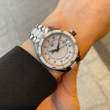 White ceramic watch on wrist