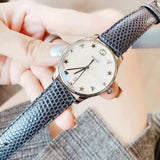 Gucci G-Timeless Signature Mother of Pearl Silver Dial Blue Leather Strap Watch For Women - YA1264049