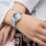 Tissot T Lady Flamingo Blue Mother of Pearl Dial Silver Steel Strap Watch For Women - T094.210.11.121.00