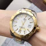 TAG Heuer Aquaracer WAY1120 Stainless Steel Watch with Gold Accents