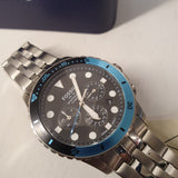 Fossil watch with blue bezel, photo from WhatsApp, July 6, 2022
