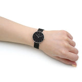 Daniel Wellington Petite Ashfield silver watch on wrist