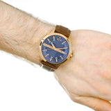 Armani Exchange men's watch with blue dial and brown leather strap