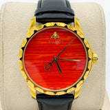 Gucci G Timeless Coral Red Dial Black Leather Strap Watch For Men - YA126464