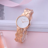 Calvin Klein Snake Silver Dial Rose Gold Steel Strap Watch For Women - K6E23646