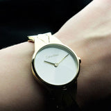 Calvin Klein Snake Silver Dial Yellow Gold Steel Strap Watch For Women - K6E23546