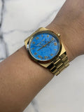 Michael Kors Channing Turquoise Dial Gold Steel Strap Watch For Women - MK5894