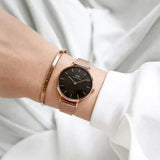 Daniel Wellington Petite Melrose Black Dial Rose Gold Mesh Strap Watch For Women - DW00100303