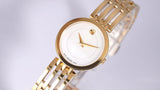 Movado Esperanza 28mm Mother of Pearl Dial Gold Steel Strap Watch For Women - 0607054