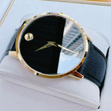 Movado men's watch with black face and gold accents