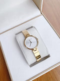 Calvin Klein Authentic Silver Dial Gold Steel Strap Watch for Women - K8G23546