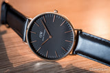 Daniel Wellington watch dw00100127-1 with black face and leather strap