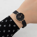 Daniel Wellington DW00100245_1 black watch on wrist