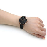 Daniel Wellington black watch on wrist