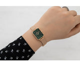 DW00100437 Green Face Watch on Wrist