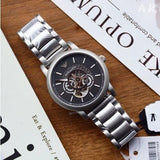 Emporio Armani Meccanico Automatic Skeleton Black Dial Silver Steel Strap Watch For Men - AR60021
