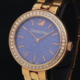 Swarovski Daytime Glittering Blue Dial Rose Gold Steel Strap Watch for Women - 5182277