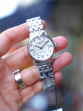 Tissot Chemin Des Tourelles Powermatic 80 Rubies Mother of Pearl Dial Silver Steel Strap Watch For Women - T099.207.11.113.00