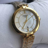 Tissot Flamingo Mother of Pearl Dial Gold Steel Strap Watch For Women - T094.210.33.111.00