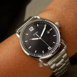 Fossil The Commuter Black Dial Silver Steel Strap Watch for Men - FS5391