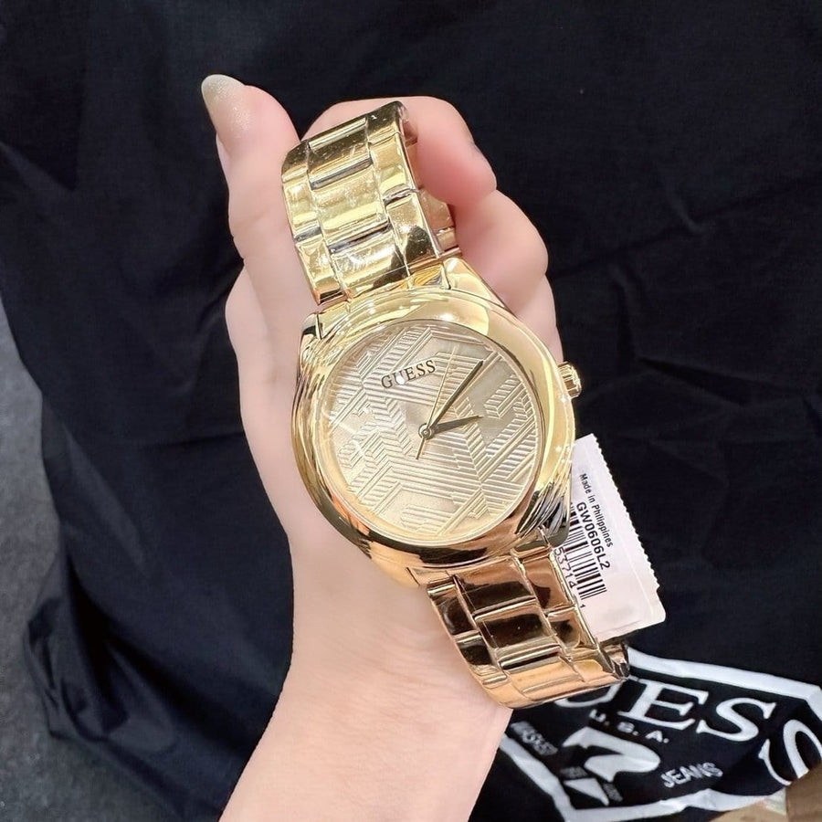 Guess Cubed Analog Gold Dial Gold Steel Strap Watch For Women - GW0606L2