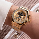 Guess women's gold watch with crystals and golden strap