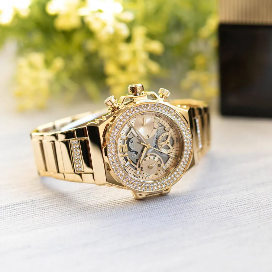 Guess women's gold watch with crystals and golden strap