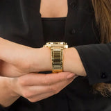 Guess women's gold watch with crystals and metal strap