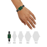 Green dial rectangular watch on wrist