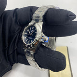 Tag Heuer Aquaracer watch held in hand